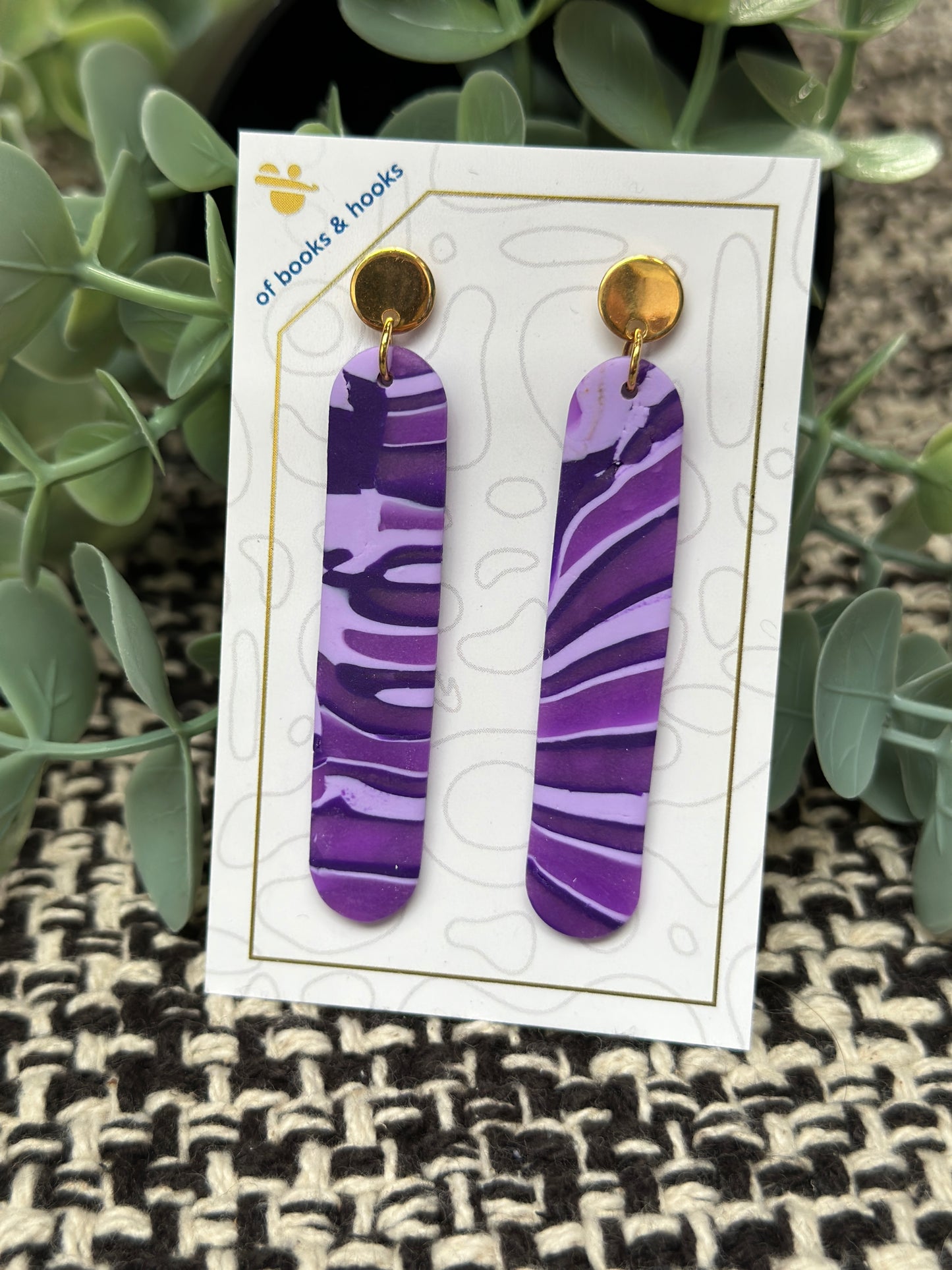 swirly purple earrings